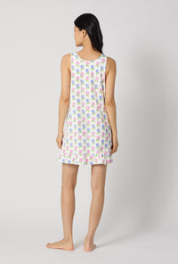 A lady wearing Cottage Parlor Ruffle Stretch Jersey Chemise back view