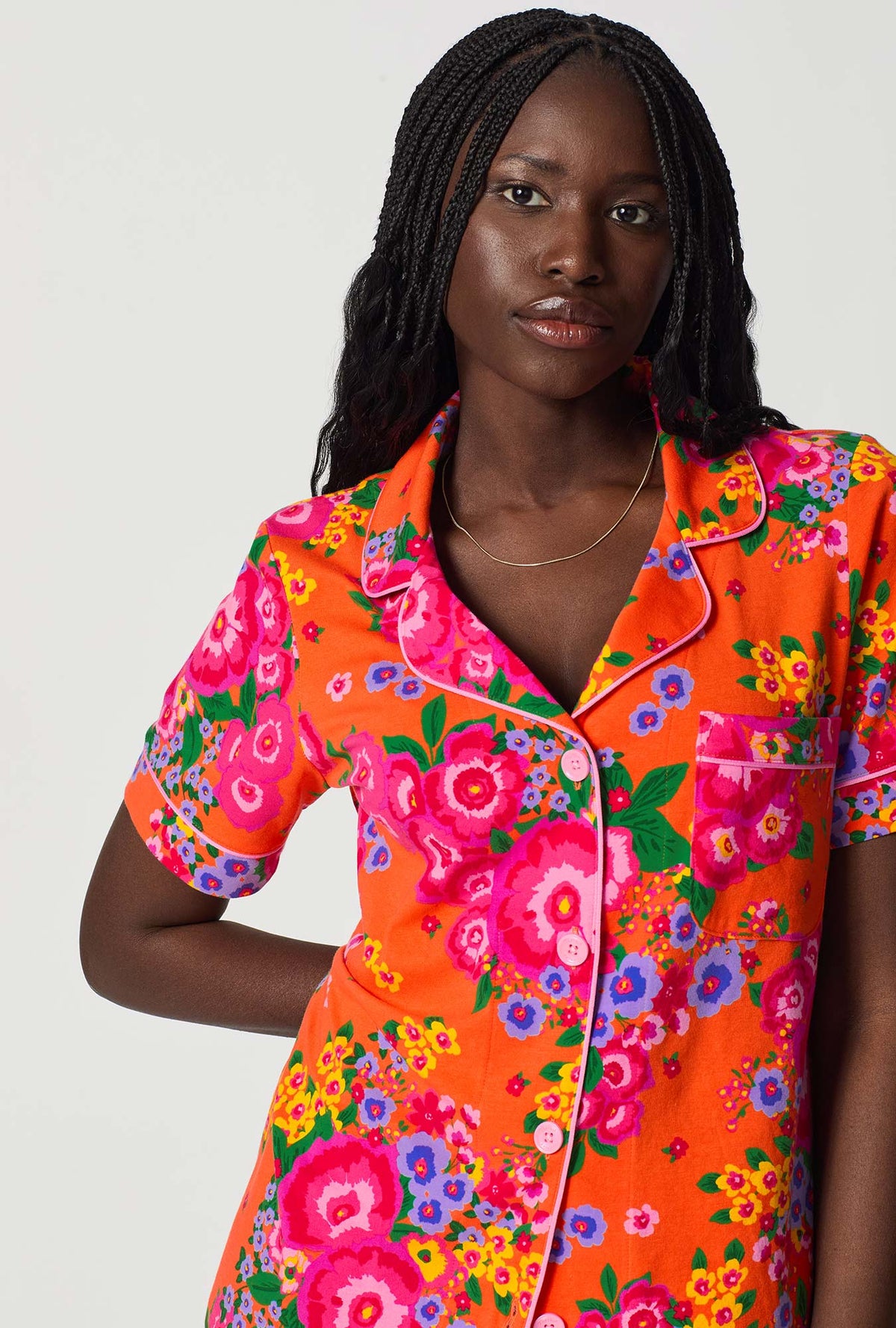 A closeup of A lady wearing Orange Short Sleeve Classic Shorty Stretch Jersey Pj Set