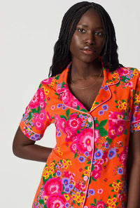 A closeup of A lady wearing Orange Short Sleeve Classic Shorty Stretch Jersey Pj Set