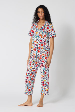 A Lady Wearing Ottoman Bloom Short Sleeve Classic Stretch Jersey Cropped Pj Set in a side angled pose