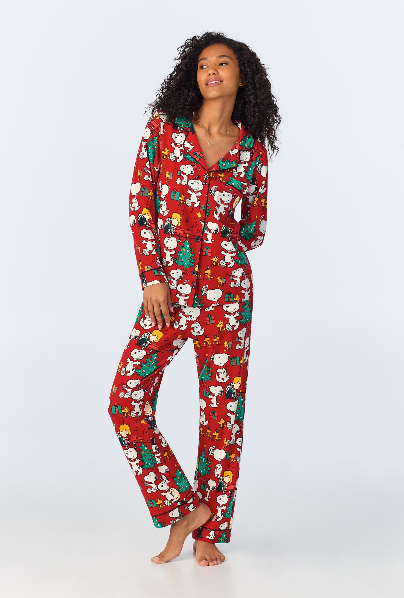 A lady wearing Peanuts® Festive Fun Long Sleeve Classic Stretch Jersey PJ Set