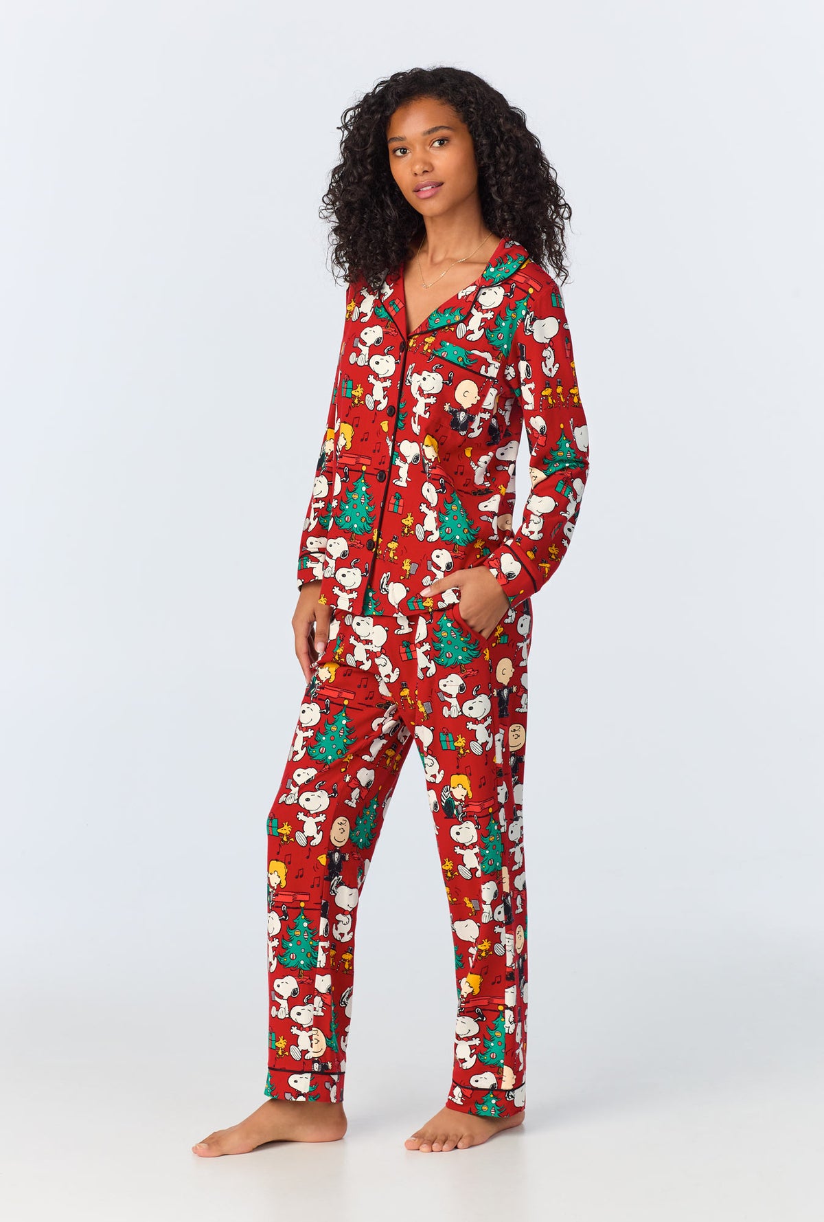 A lady wearing Peanuts® Festive Fun Long Sleeve Classic Stretch Jersey PJ Set