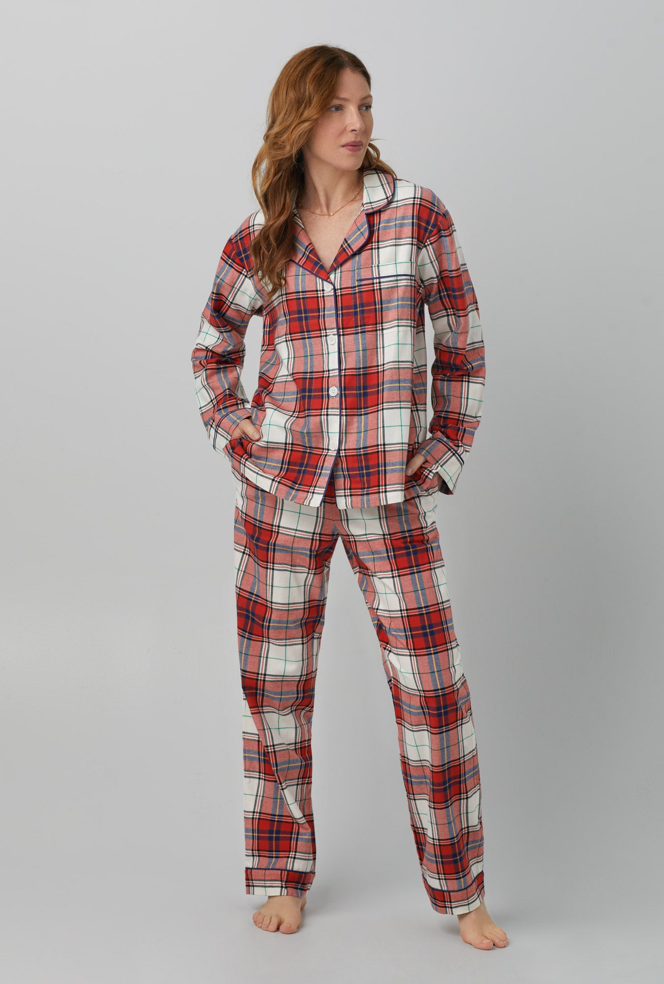 A lady wearing red Long Sleeve Classic Woven Cotton Portuguese Flannel PJ Set with Festive Tartan print