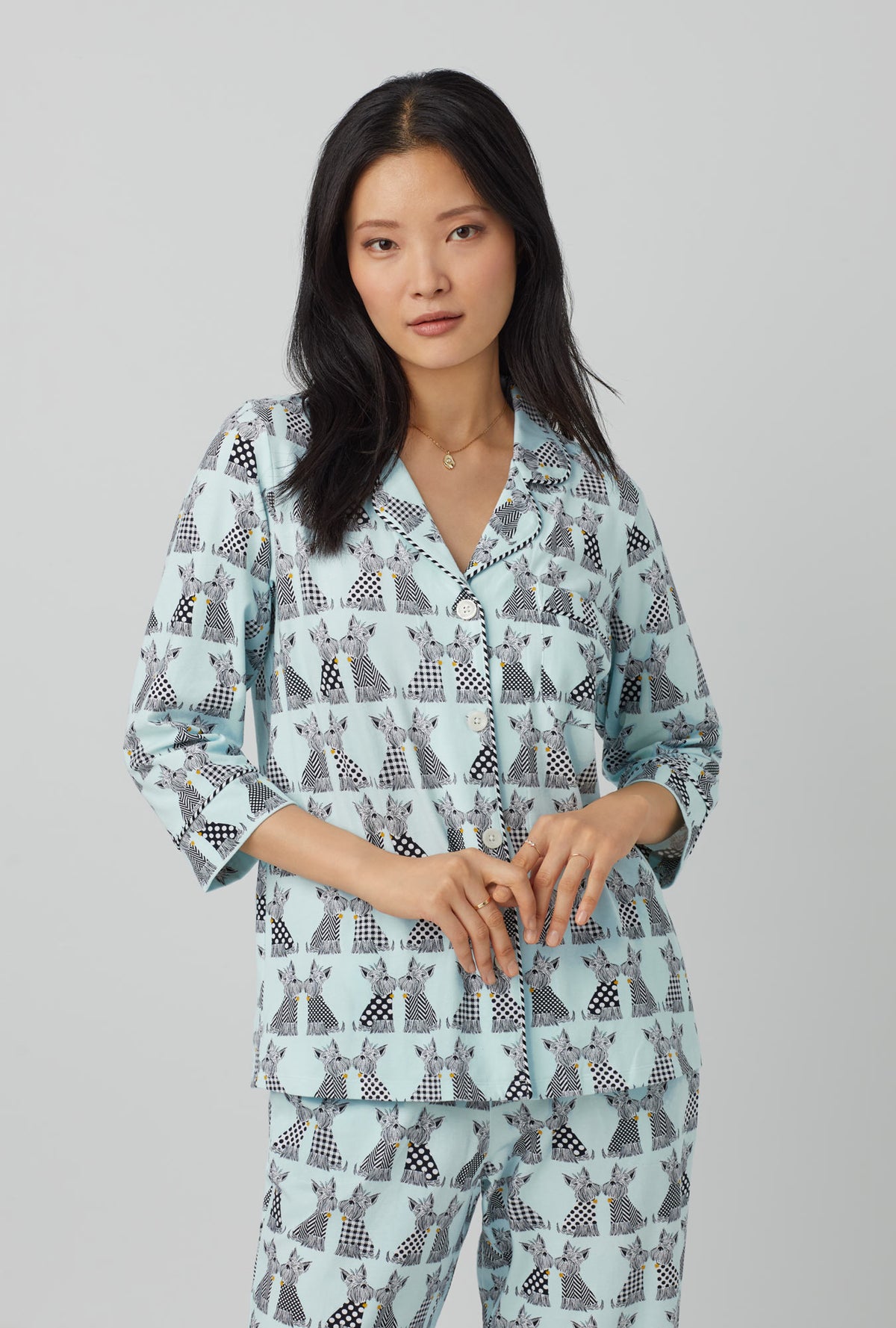 A lady wearing blue 3/4 Sleeve Classic Stretch Jersey Cropped PJ Set with Cozy Sweater  print