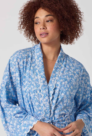 A lady wearing Something Blue Banded Collar Stretch Jersey Robe