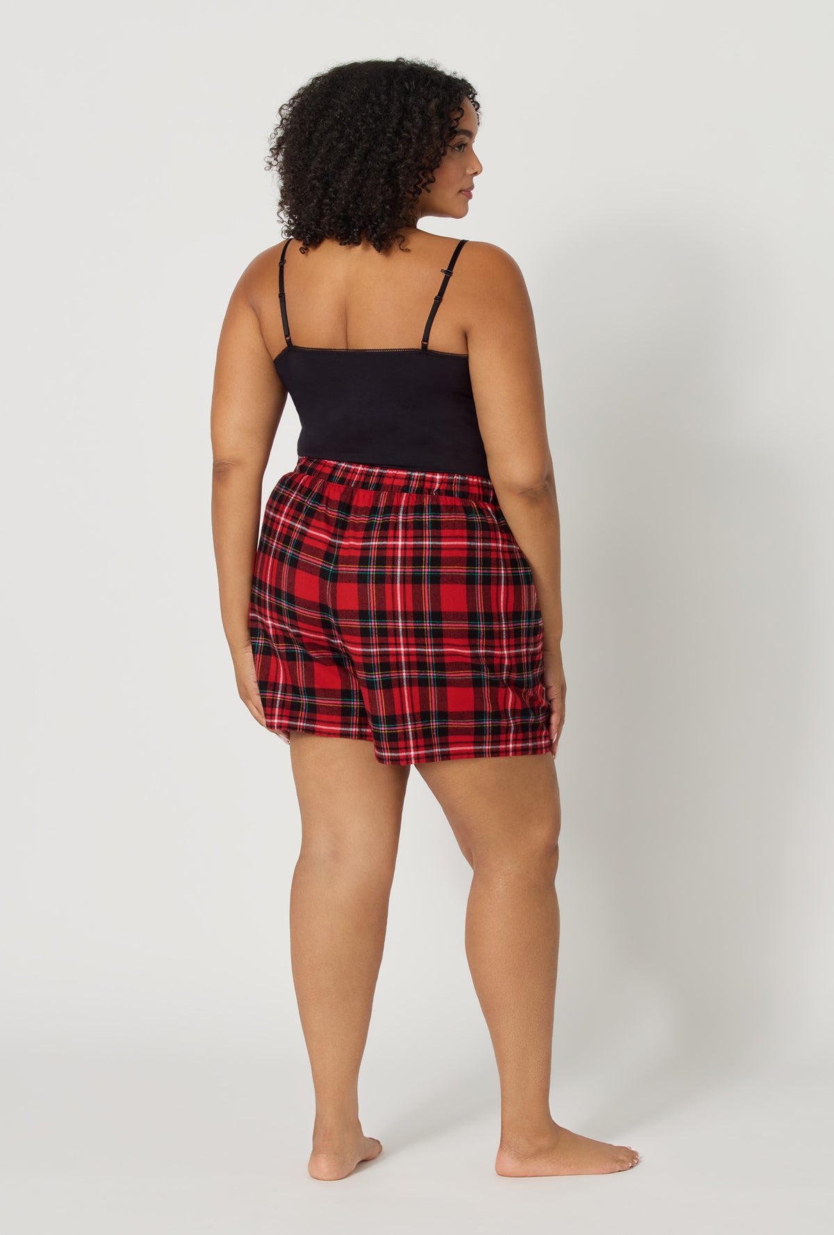 A lady plus size wearing Fireside Plaid Woven Portuguese Flannel Boxer Short back view