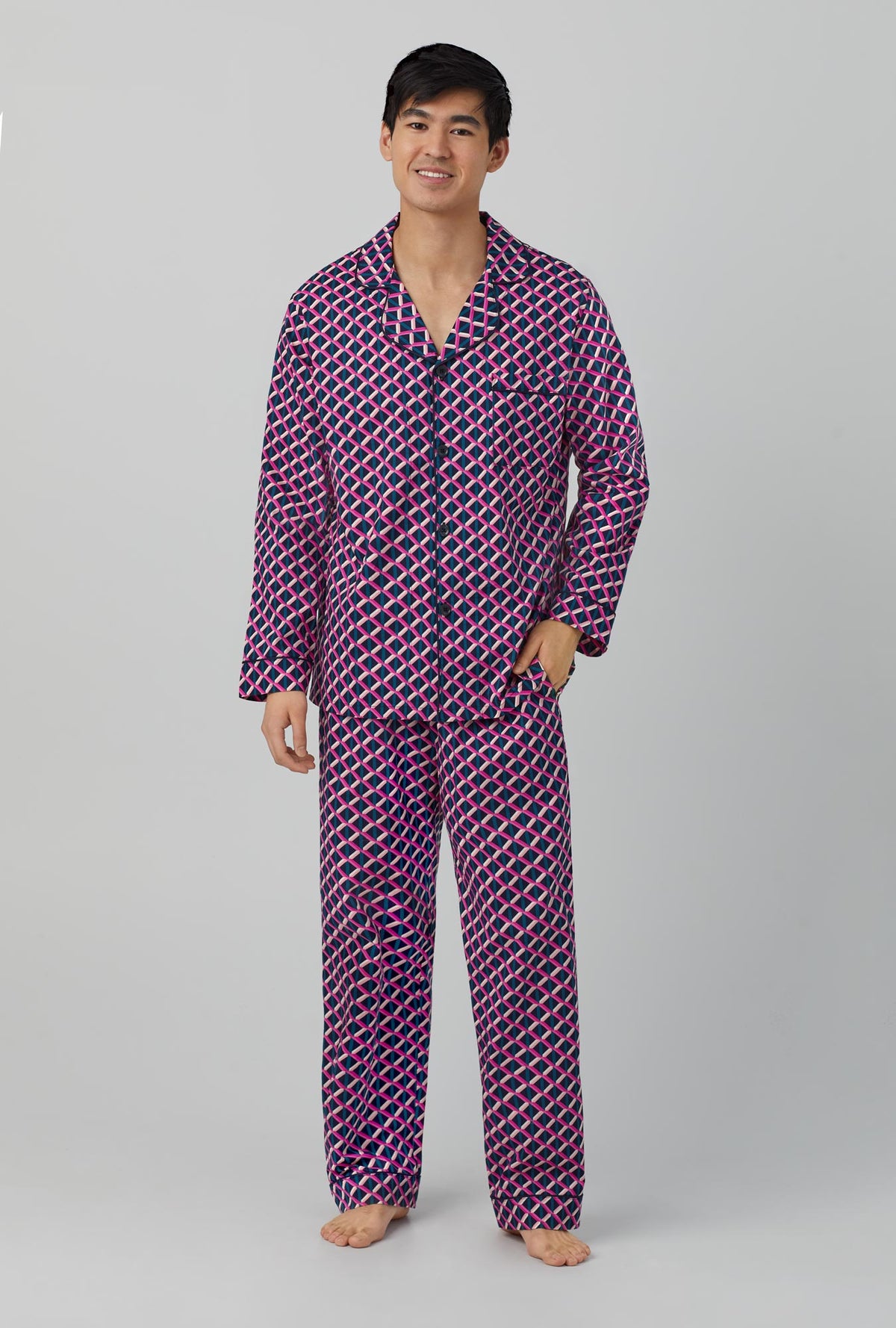 A man wearing long sleeve classic woven cotton poplin pj set with Mr. turk lattice geo print.