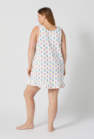 A lady wearing plus size Cottage Parlor Ruffle Stretch Jersey Chemise back view