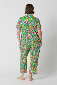 A Lady Wearing Plus Size Sultana Short Sleeve Classic Stretch Jersey Cropped Pj Set in a back view pose