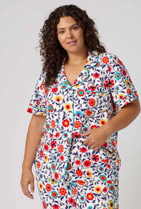 A Lady Wearing Plus Size Ottoman Bloom Short Sleeve Classic Stretch Jersey Cropped Pj Set in a front half close up shot