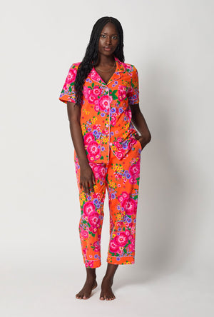 A lady wearing Orange Short Sleeve Classic Stretch Jersey Cropped Pj Set front view
