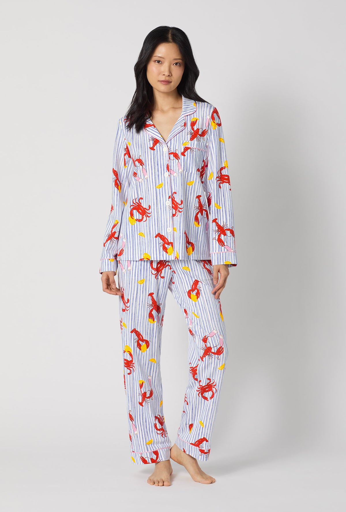 A lady wearing Coastal Feast Long Sleeve Classic Stretch Jersey Pj Set