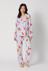 A lady wearing Coastal Feast Long Sleeve Classic Stretch Jersey Pj Set