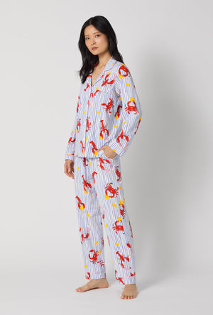 A lady wearing Coastal Feast Long Sleeve Classic Stretch Jersey Pj Set looking front