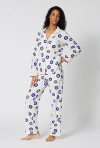 A Women Wearing Eyeconic Long Sleeve Classic Stretch Jersey Pj Set in a front side angled pose