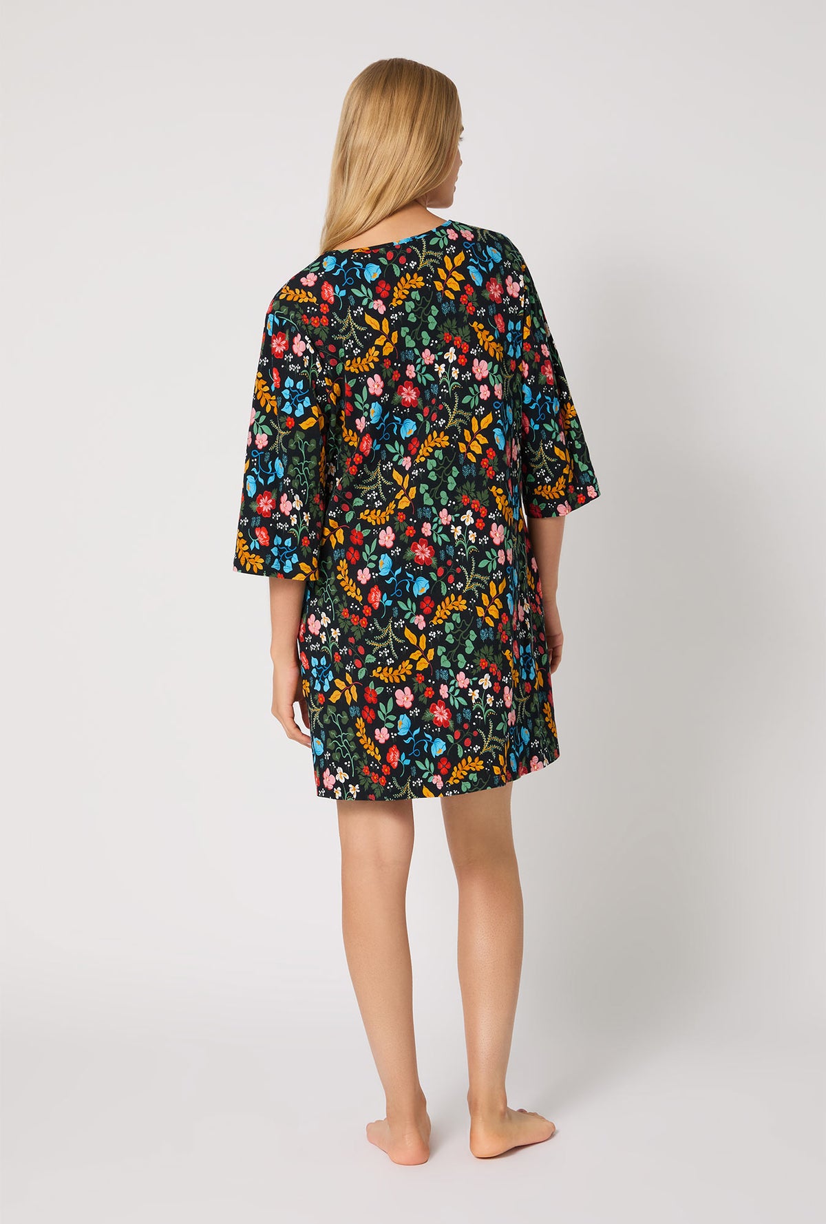 A lady wearing Winter Blooms Stretch Jersey Sleep Dress