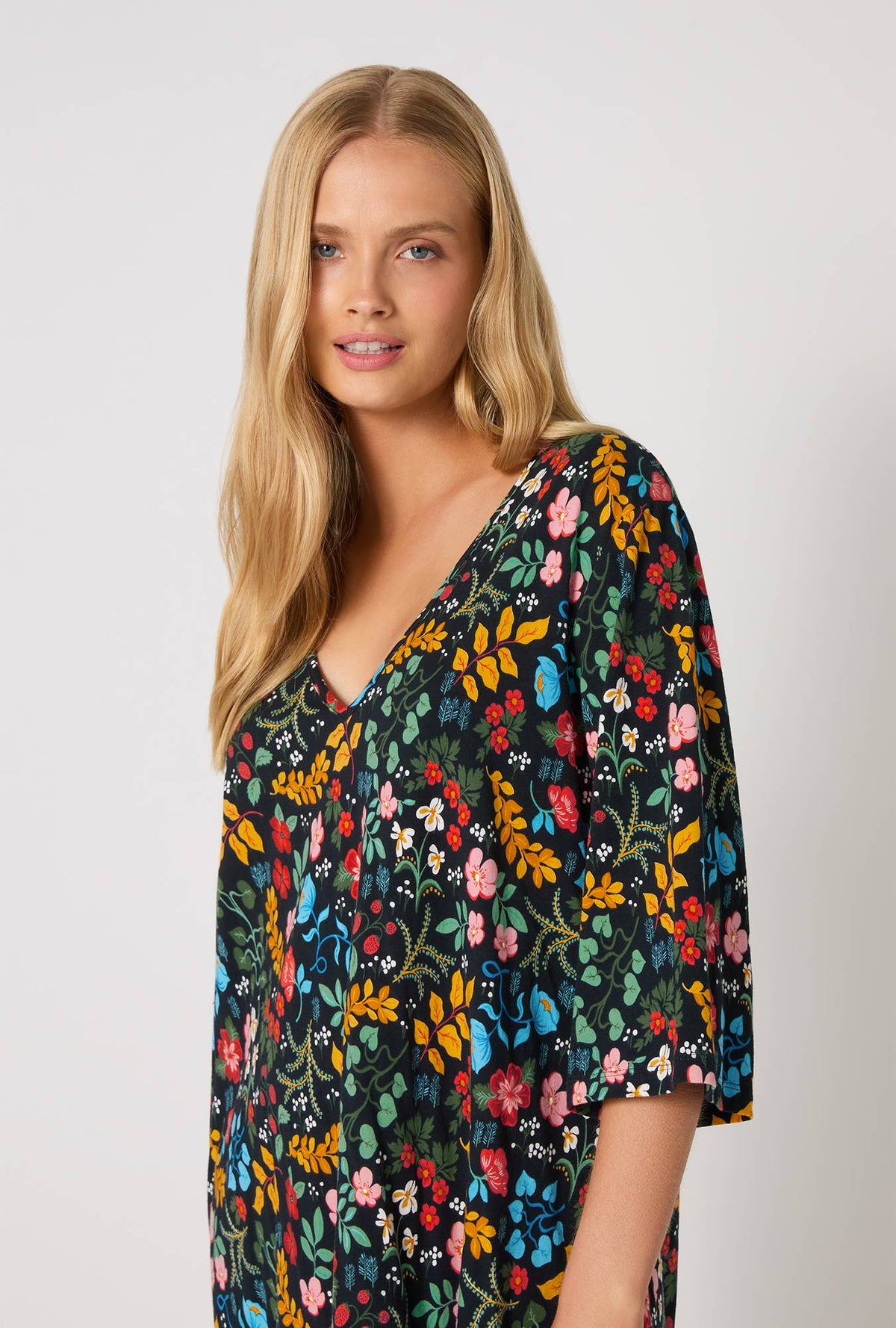 A lady wearing Winter Blooms Stretch Jersey Sleep Dress