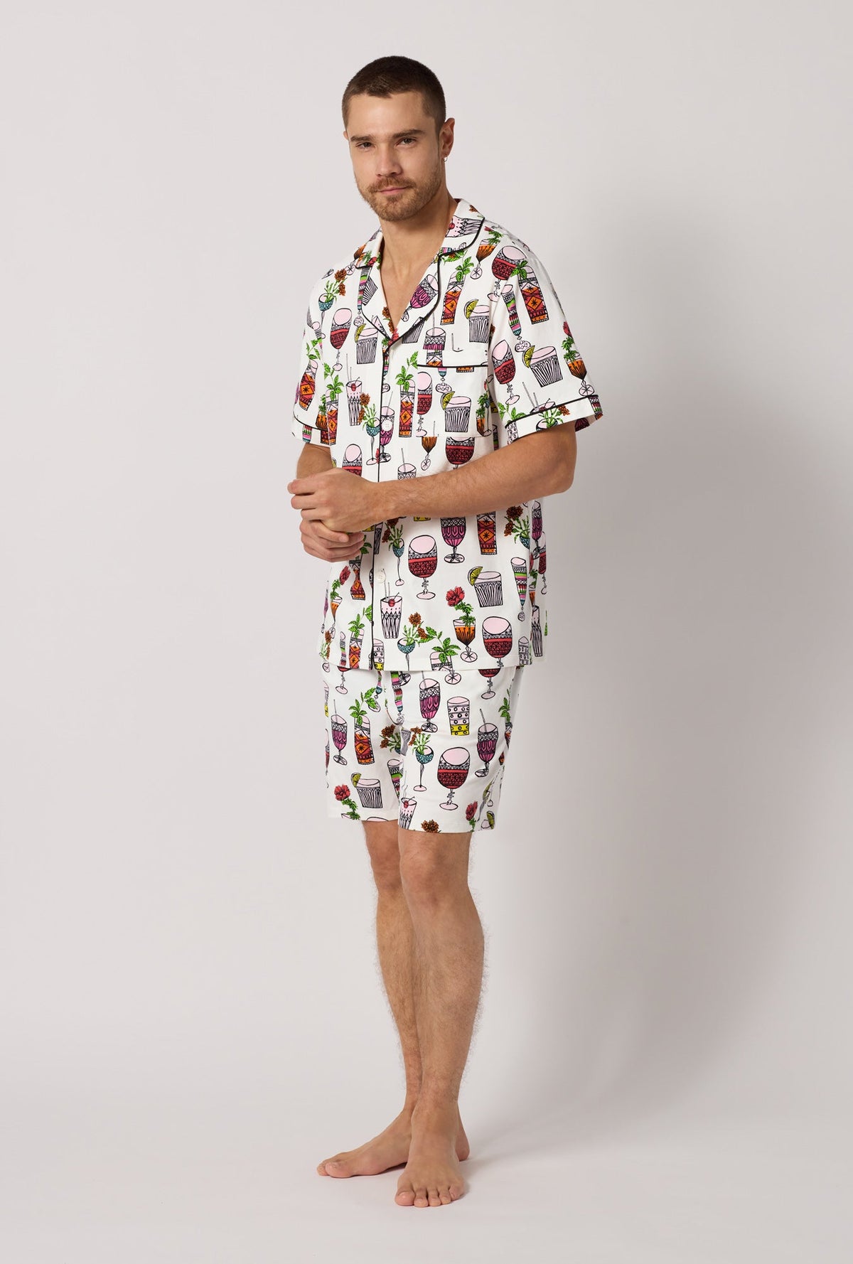 A man wearing  White Men's Short Sleeve Classic Stretch Jersey Short Pj Set side view
