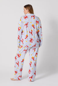 A lady wearing plus size Coastal Feast Long Sleeve Classic Stretch Jersey Pj Set  back view