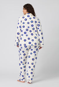 A Women Wearing Plus Size Eyeconic Long Sleeve Classic Stretch Jersey Pj Set in a back view pose