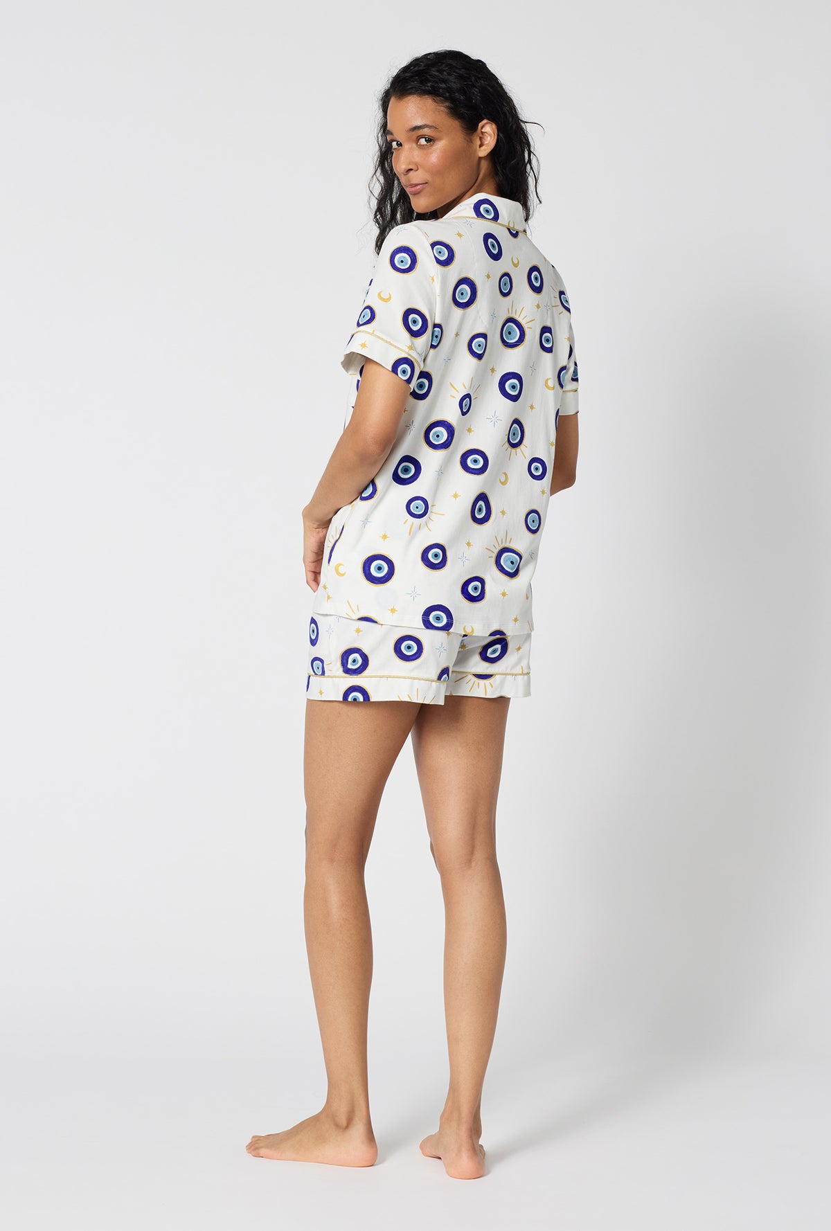 A Lady Wearing Eyeconic Short Sleeve Classic Shorty Stretch Jersey Pj Set in a back view pose