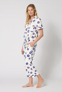A Lady Wearing Eyeconic Short Sleeve Classic Stretch Jersey Cropped Pj Set in a side angled pose