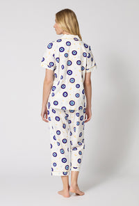 A Lady Wearing Eyeconic Short Sleeve Classic Stretch Jersey Cropped Pj Set in a back view pose