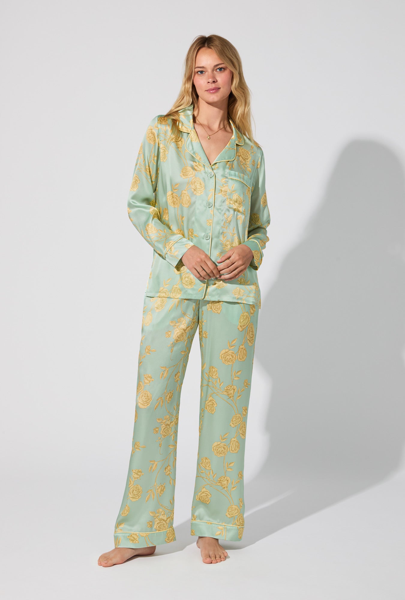 A lady wearing Royal Roses Long Sleeve Classic Woven Washable Silk Satin PJ Set