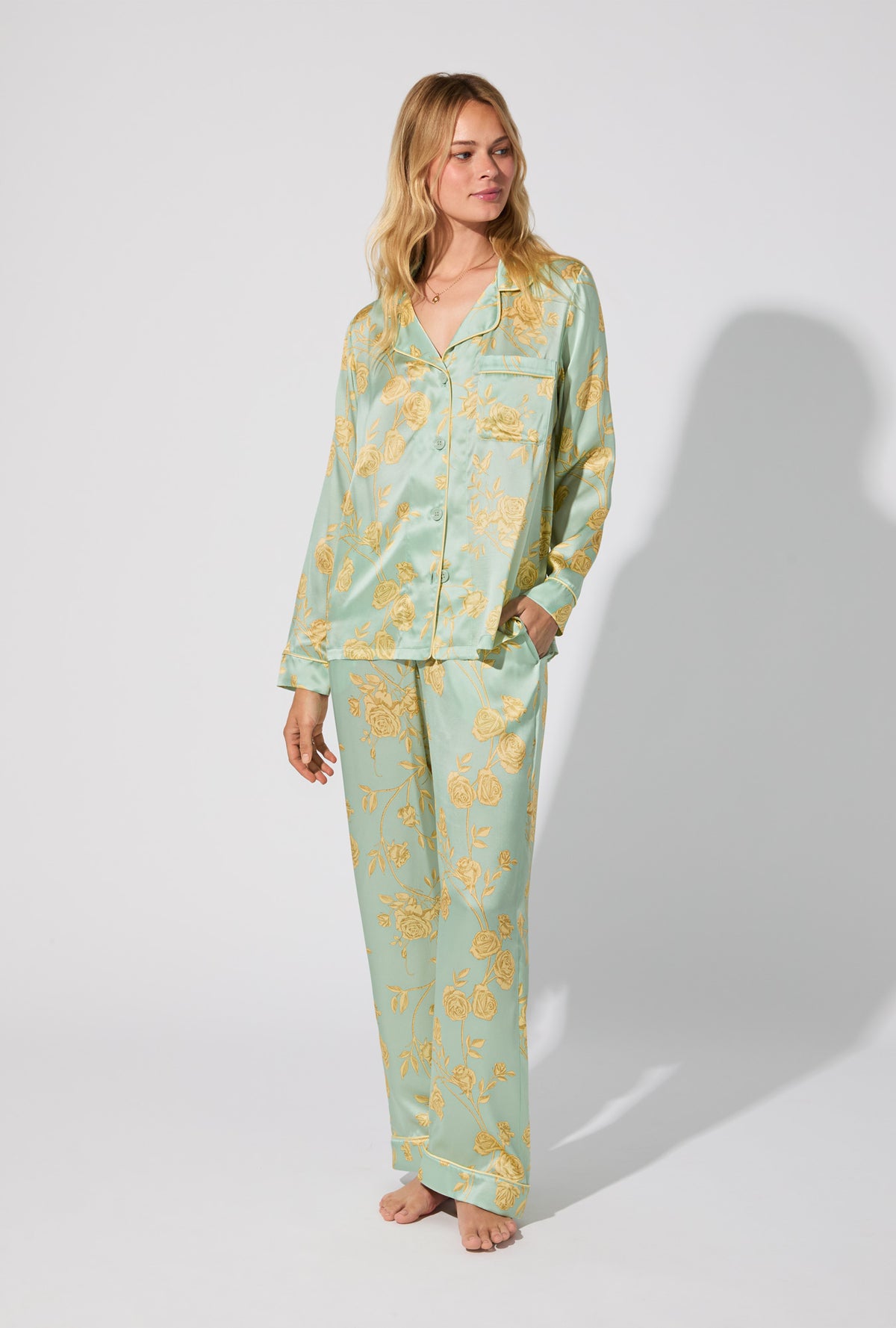 A lady wearing Royal Roses Long Sleeve Classic Woven Washable Silk Satin PJ Set