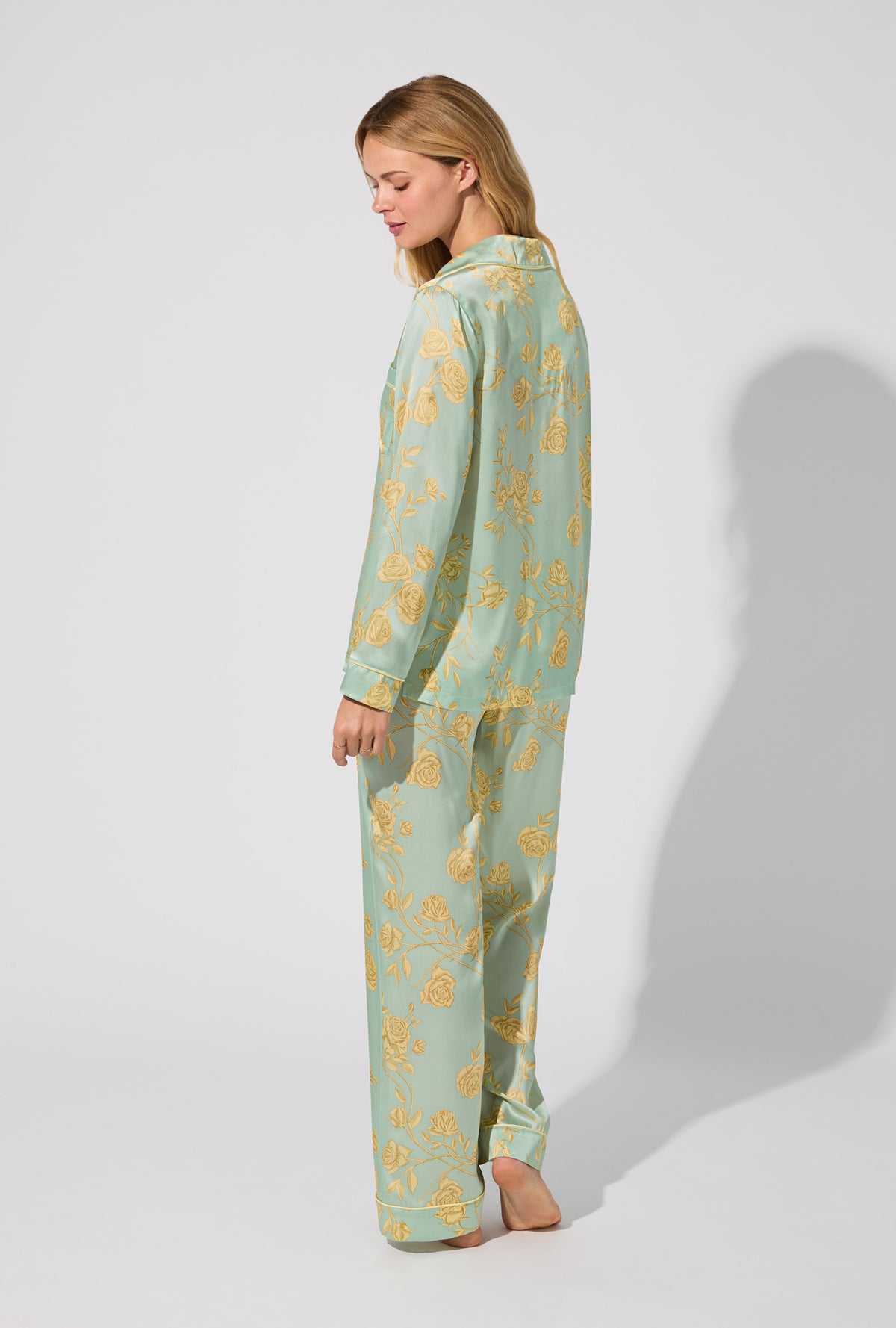 A lady wearing Royal Roses Long Sleeve Classic Woven Washable Silk Satin PJ Set