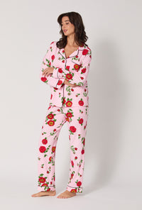 A lady wearing Falling Blooms Long Sleeve Classic Stretch Jersey Pj Set