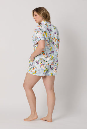 A lady wearing plus size Blue Short Sleeve Classic Shorty Stretch Jersey Pj Set back view