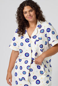 A Lady Wearing Plus Size Eyeconic Short Sleeve Classic Shorty Stretch Jersey Pj Set in a close up view pose