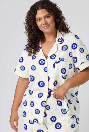 A Lady Wearing Plus Size Eyeconic Short Sleeve Classic Shorty Stretch Jersey Pj Set in a close up view pose