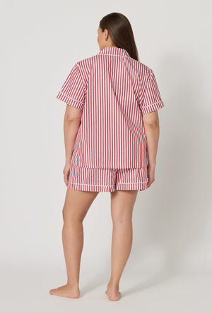 A lady wearing plus size Red Signature Stripe Short Sleeve Classic Woven Cotton Sateen Shorty Pj Set back view