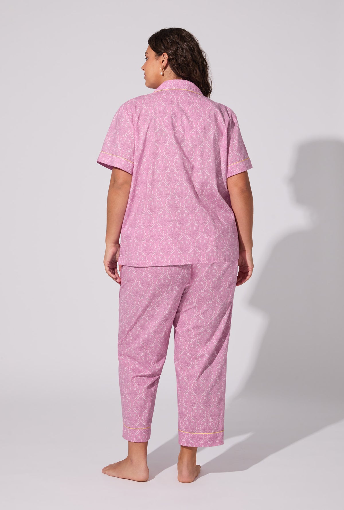 A lady wearing Colette Short Sleeve Classic Woven Cotton Poplin Cropped PJ Set