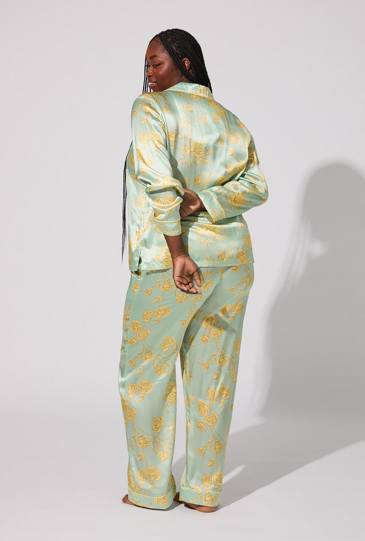 A lady wearing Royal Roses Long Sleeve Classic Woven Washable Silk Satin PJ Set
