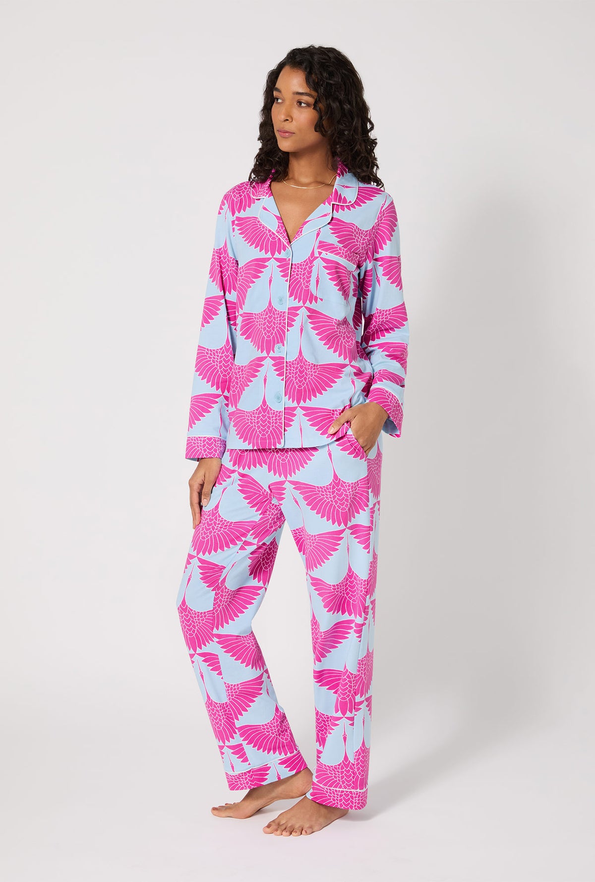 A lady wearing BedHead X Trina Turk Cranes Long Sleeve Classic Stretch Jersey PJ Set
