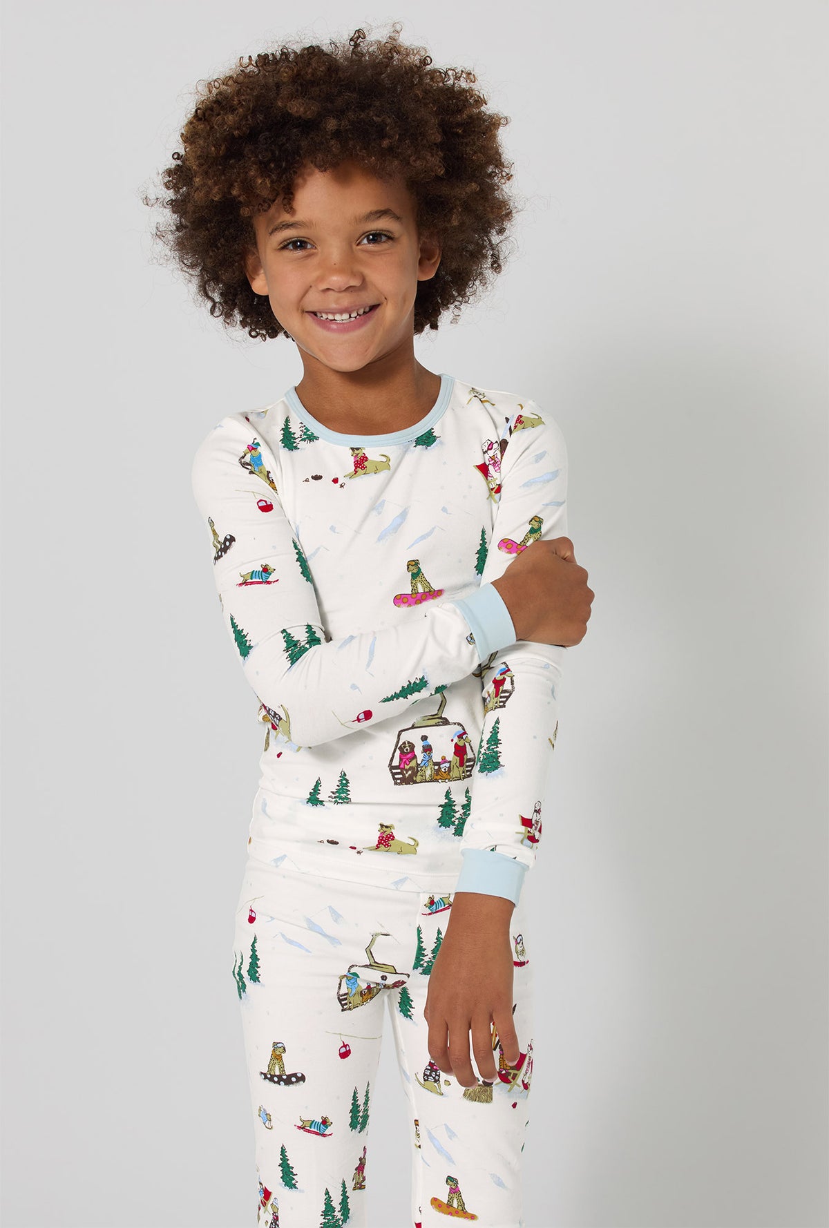 A girl wearing Ski Pups Long Sleeve Stretch Jersey Kids Pj Set