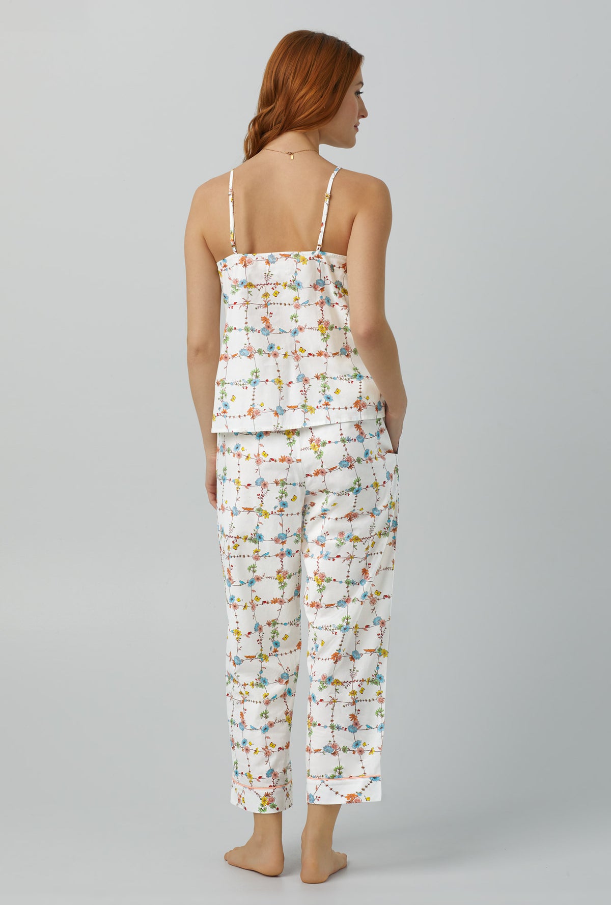 A lady wearing Tank Woven Cotton Poplin Cropped PJ Set with spring vines print