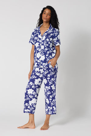 A Lady Wearing Dynasty Blue Short Sleeve Classic Stretch Jersey Cropped Pj Set in a side angled pose