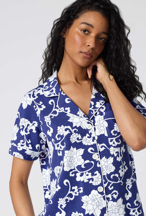 A Lady Wearing Dynasty Blue Short Sleeve Classic Stretch Jersey Cropped Pj Set in a front close up shot