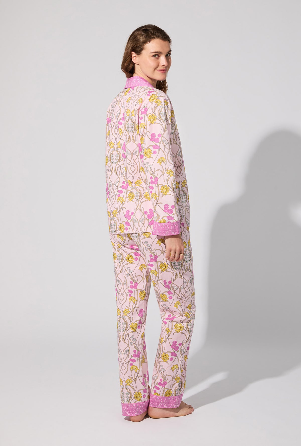 A lady wearing Fleur Nouveau Long Sleeve Classic Woven Cotton Poplin PJ set