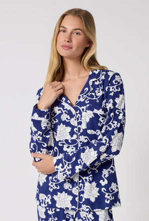 A Lady Wearing Dynasty Blue Long Sleeve Classic Stretch Jersey Pj Set in a close up shot