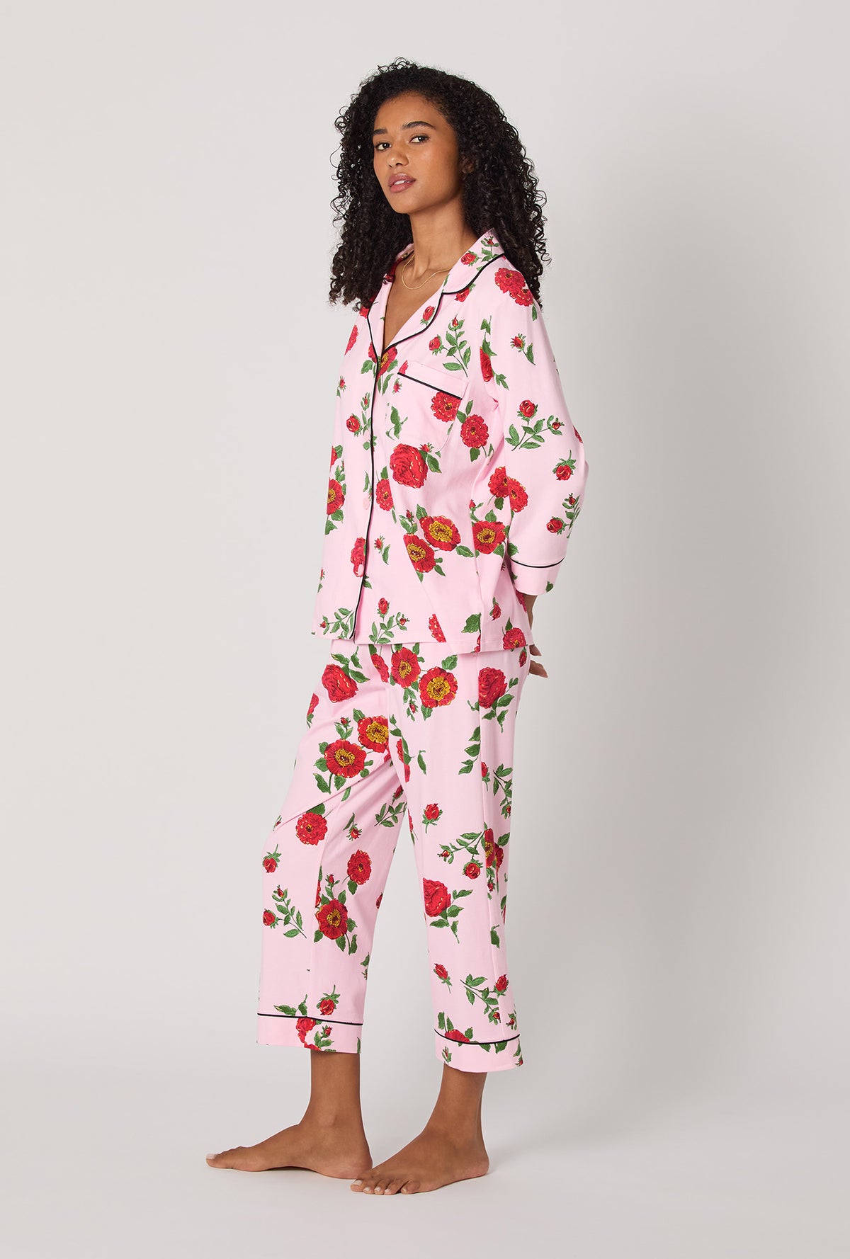 A lady wearing Falling Blooms 3/4 Sleeve Classic Stretch Jersey Cropped Pj Set