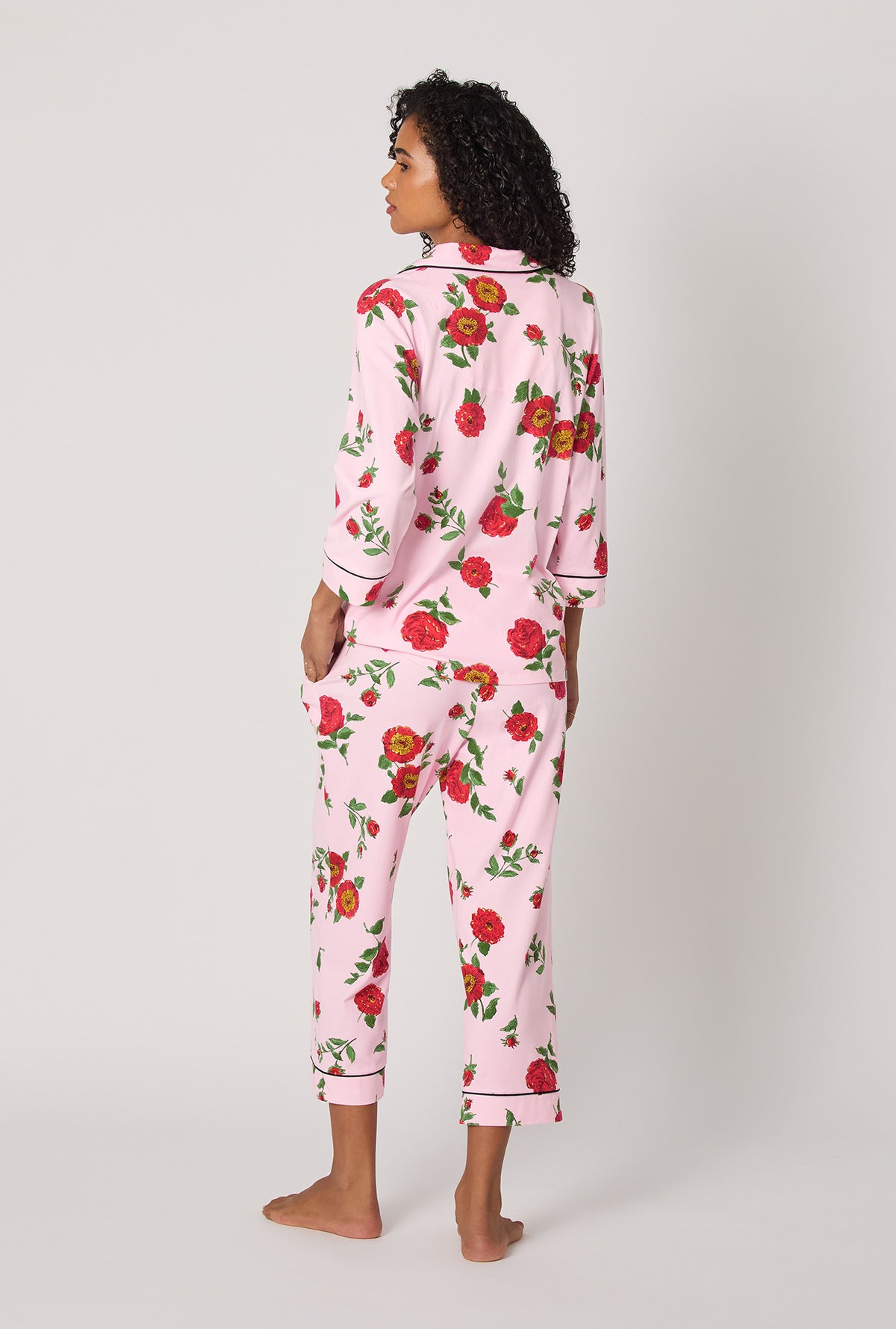A lady wearing Falling Blooms 3/4 Sleeve Classic Stretch Jersey Cropped Pj Set