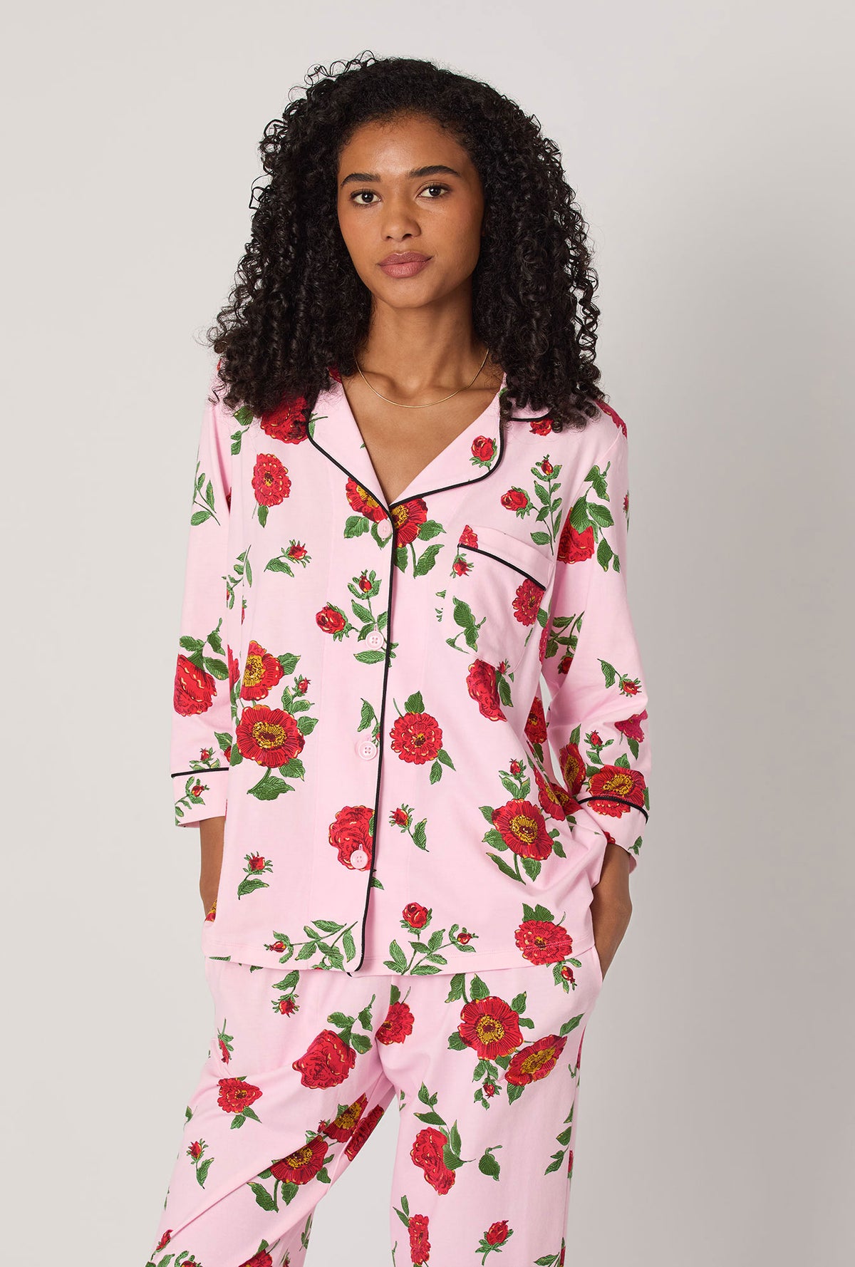 A lady wearing Falling Blooms 3/4 Sleeve Classic Stretch Jersey Cropped Pj Set