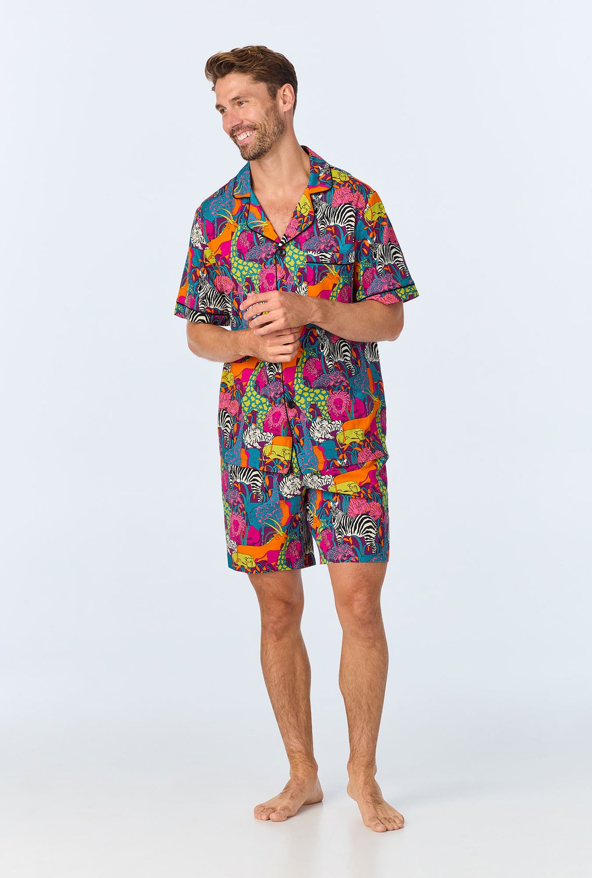 A man wearing a  Jungle Mens Short Sleeve Notch Stretch Jersey Short PJ Set