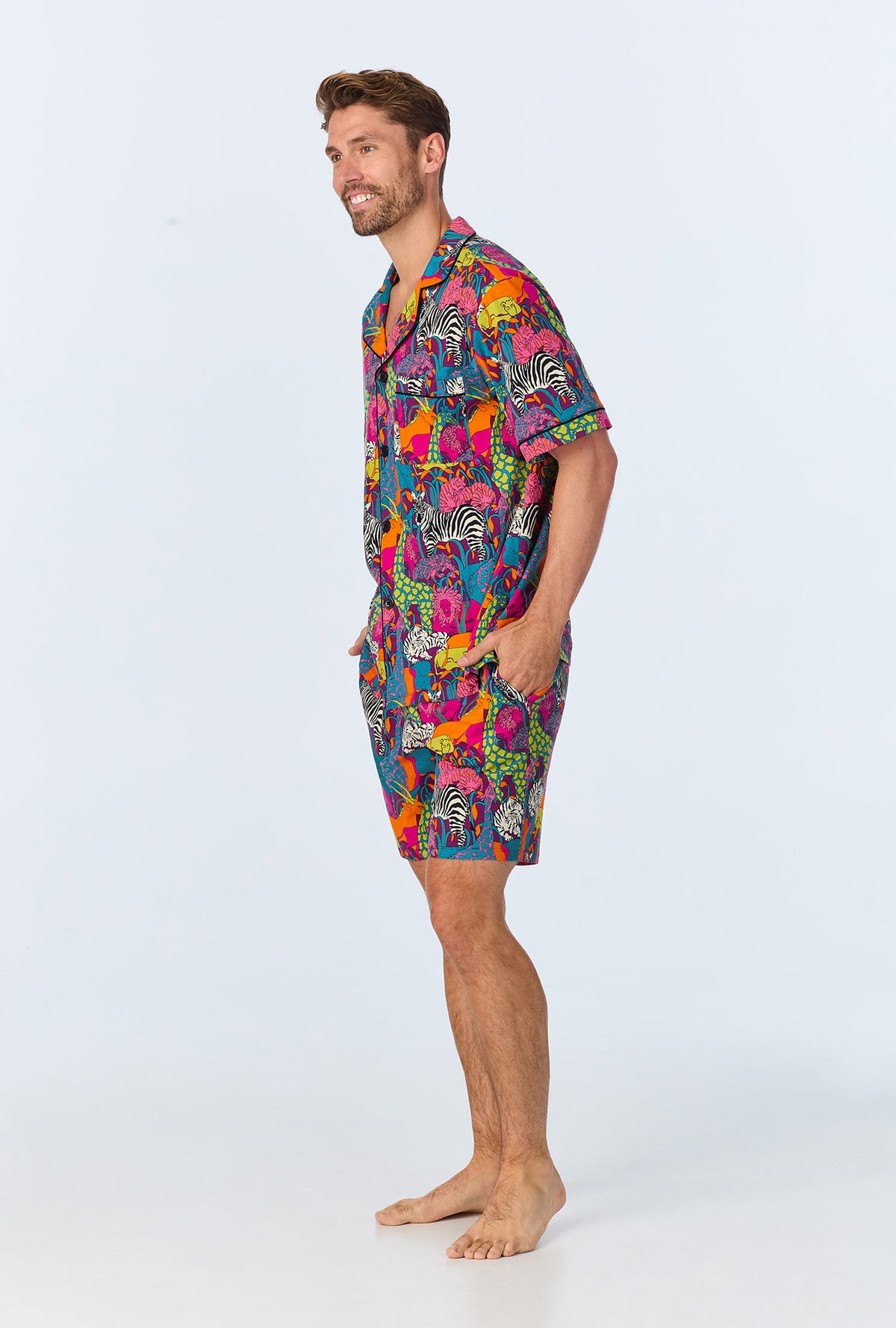 A man wearing a  Jungle Mens Short Sleeve Notch Stretch Jersey Short PJ Set