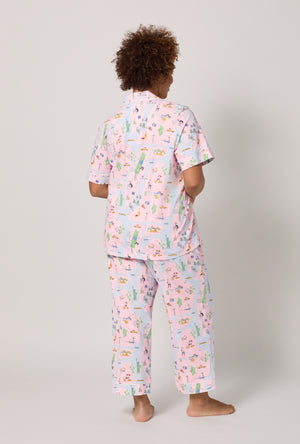 A lady wearing plus size New York, New York Short Sleeve Classic Stretch Jersey Cropped Pj Set
